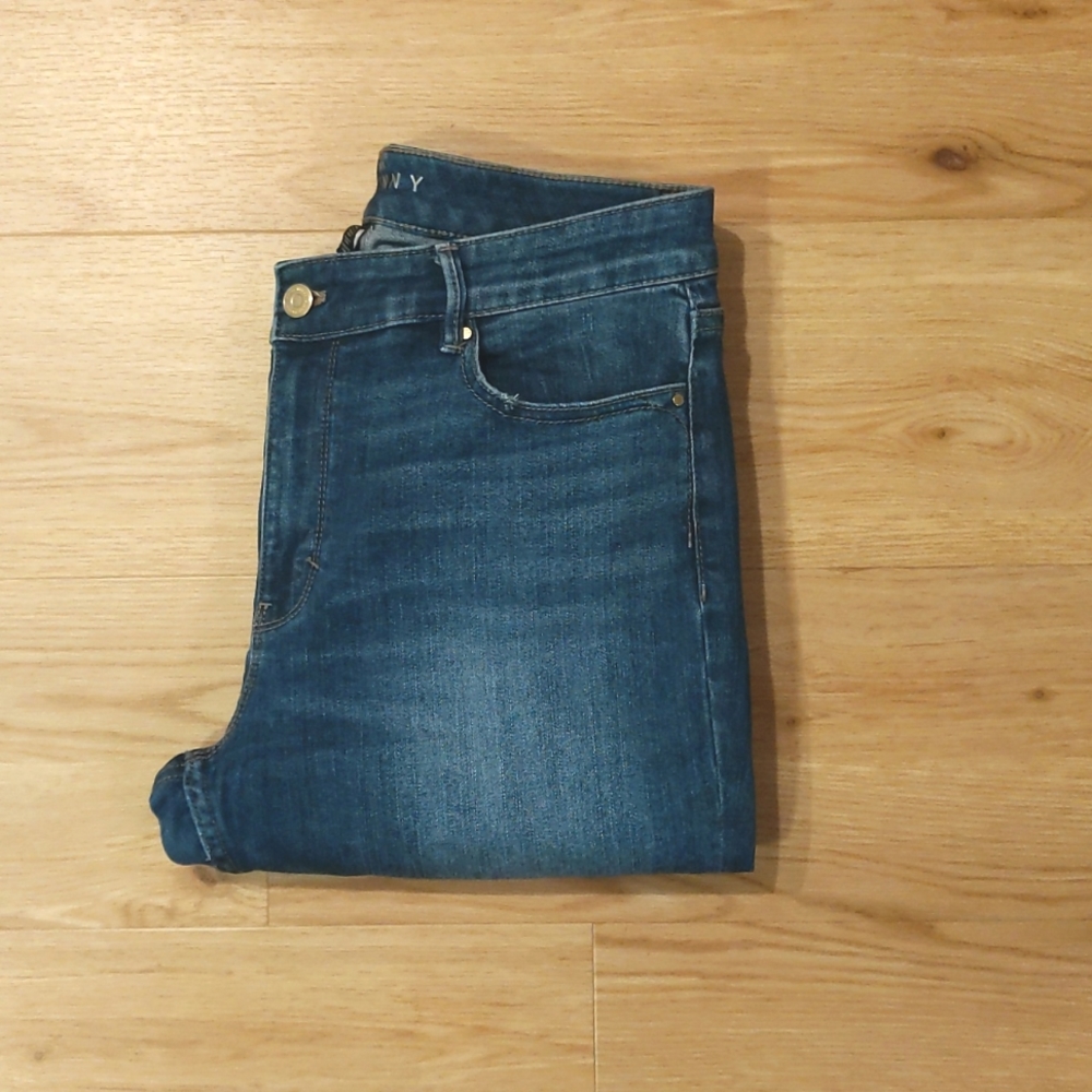 Medium color distressed skinny jeans